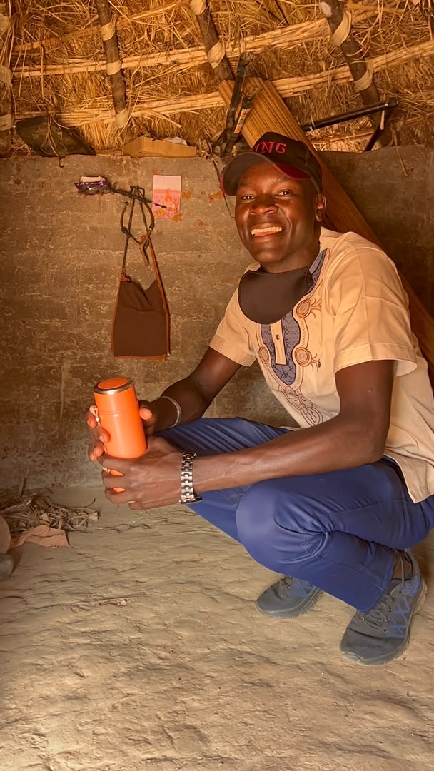 GVC field team member documenting an empty household granary in the assessed Kwania village
