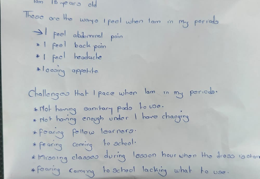 An anonymized handwritten student account describing menstrual pain, lack of sanitary pads and underwear, and fear of attending school