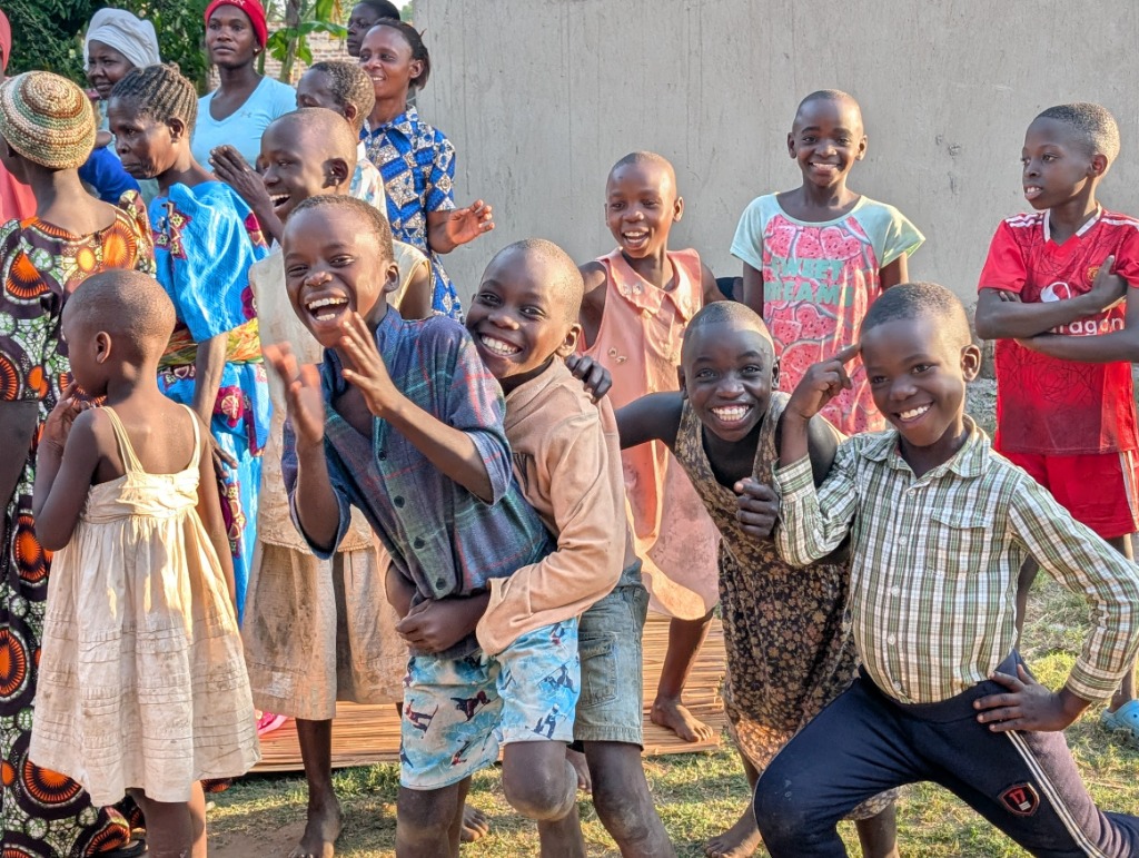 Global Village Connect team members in Uganda collaborating with local communities